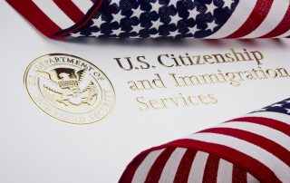 U.S. Citizenship & Immigration Logo & U.S. flag