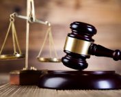 court gavel and justice scales on a table