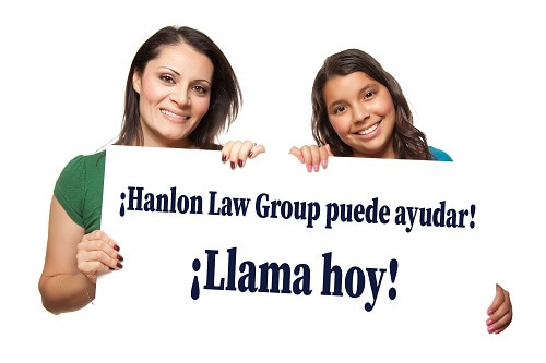 two mexican women holding a call now sign