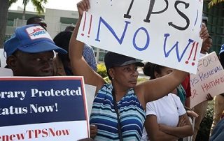 immigrant protesters demanding protected status extension