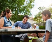 hispanic family sitting together