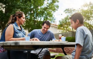 hispanic family sitting together