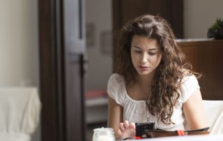 young woman on her phone