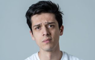 serious young hispanic man