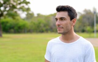 middle aged hispanic man in park