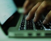 typing on laptop closeup